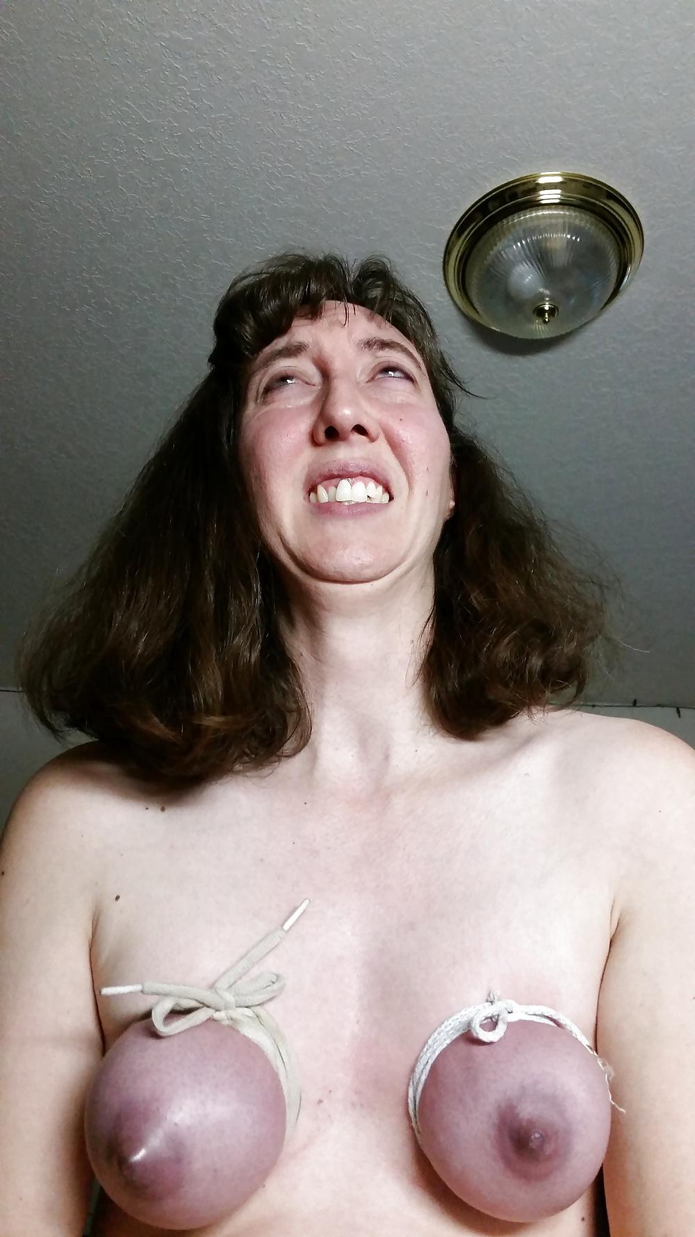 25P My wife's first time breast binding with weights.