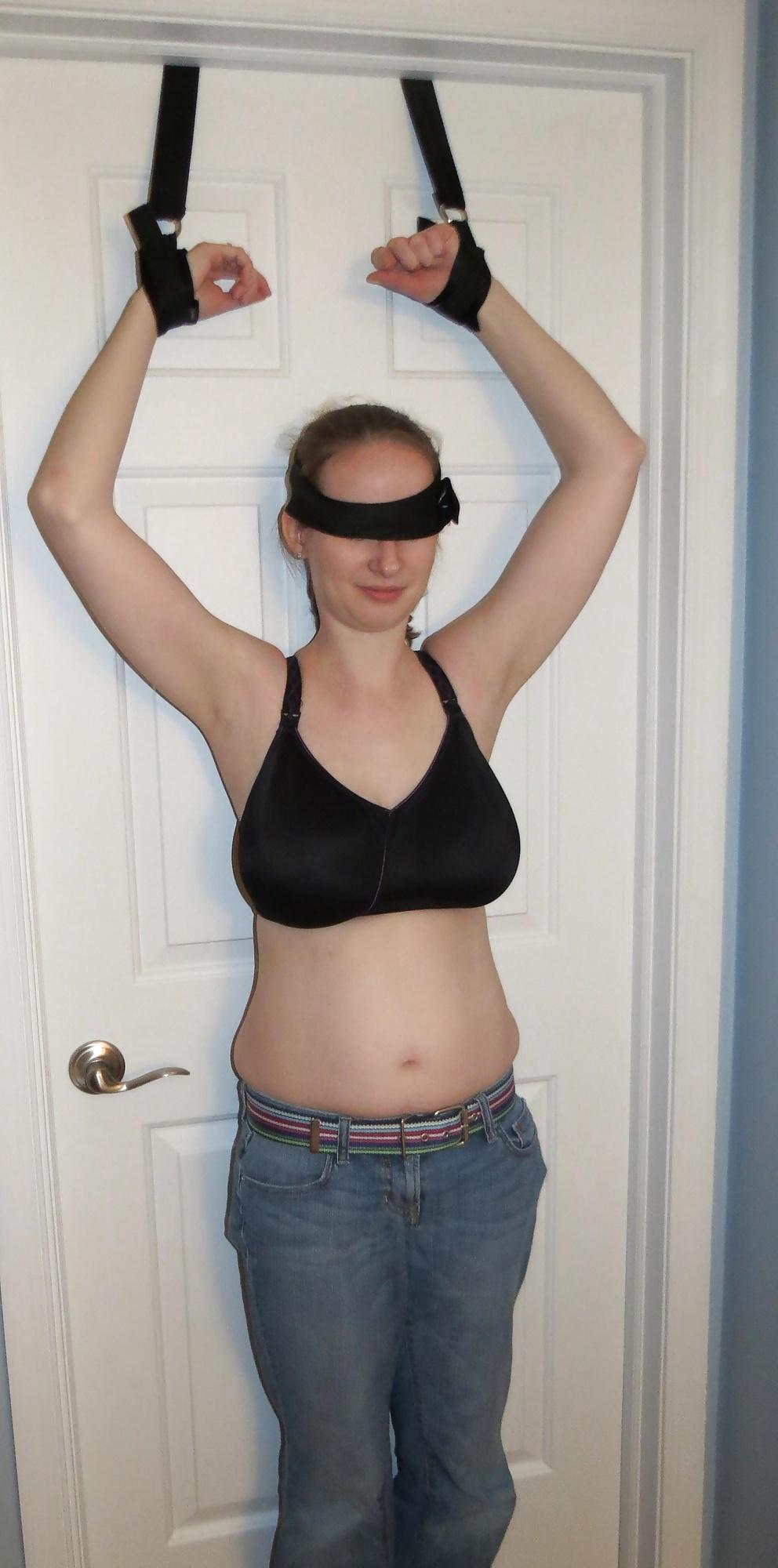 9P Wife blindfolded, topless, and bound to door