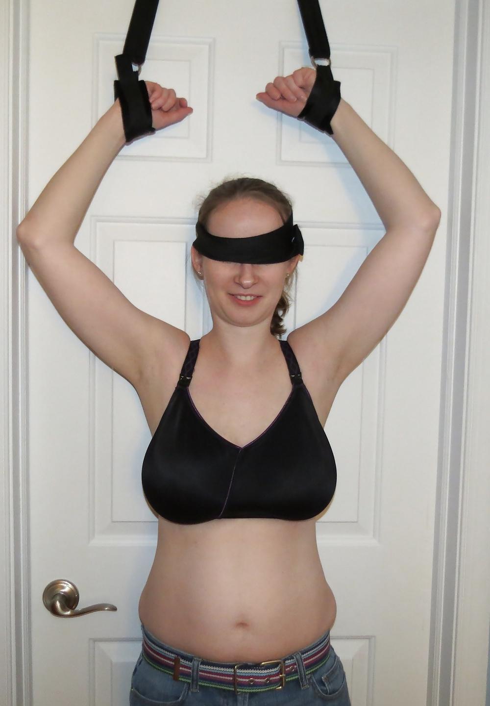 9P Wife blindfolded, topless, and bound to door