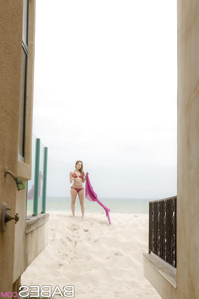 12P Amazing wet babe Remi showing that beautiful body on the beach