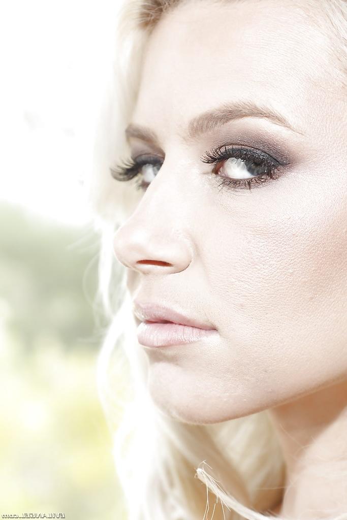 16P Tempting blonde babe Anikka Albrite reveals her tits and gets blindfolded