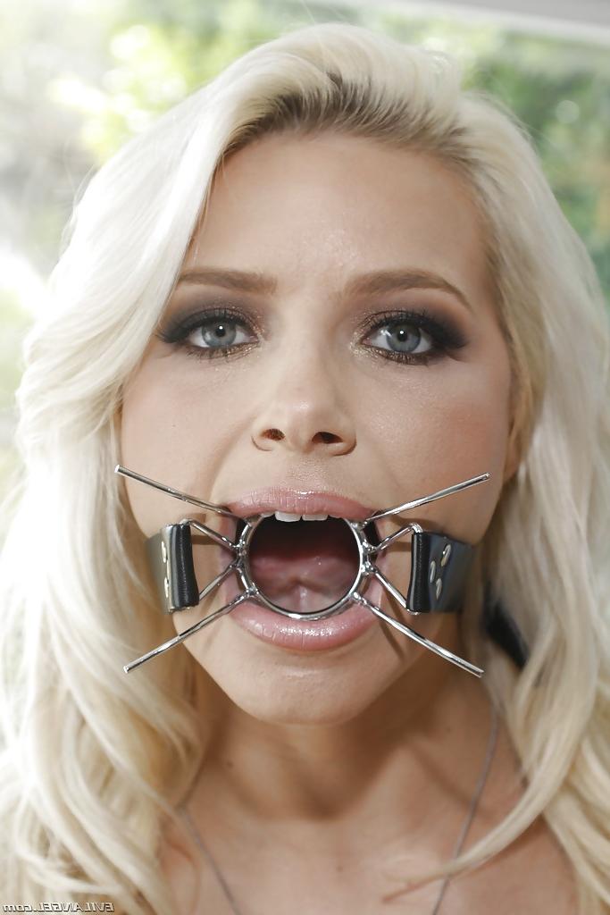 16P Tempting blonde babe Anikka Albrite reveals her tits and gets blindfolded