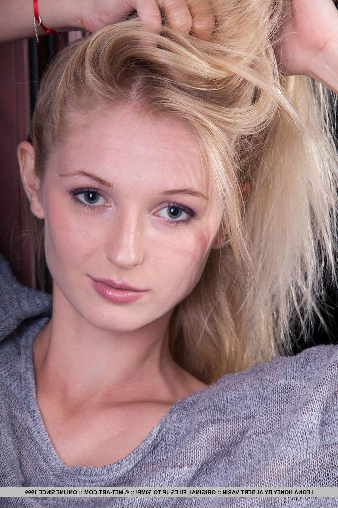 18P Blonde glamour babe Leona Honey revealing tiny teen breasts while stripping