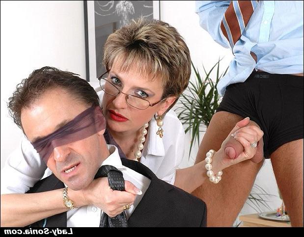 14P Mature femdom tortures a blindfolded guy and gives a blowjob to another