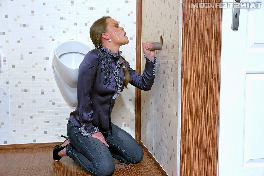 16P Lovely babe on high heels sucks a dildo through a glory hole and gets bukkaked