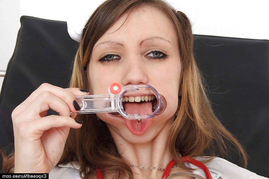 16P Skinny gyno nurse playing with a vibrator and medical tools