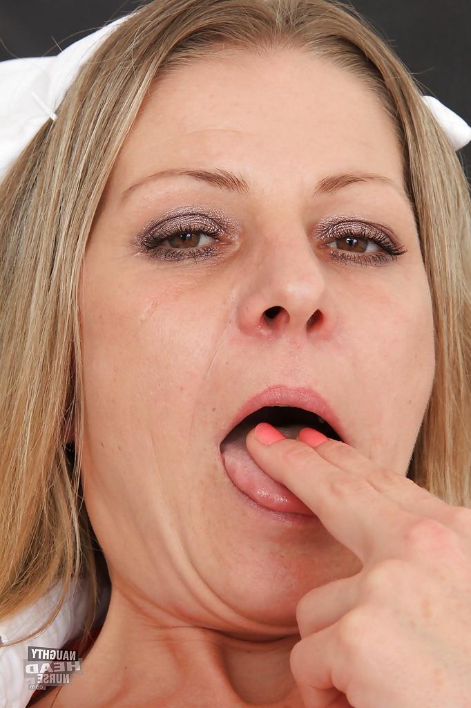 16P Uniformed nurse Liba reveals her mature shaved pussy in high heels