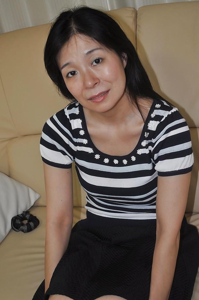 16P Lewd asian MILF Akiko Oda getting naked and spreading her pussy lips