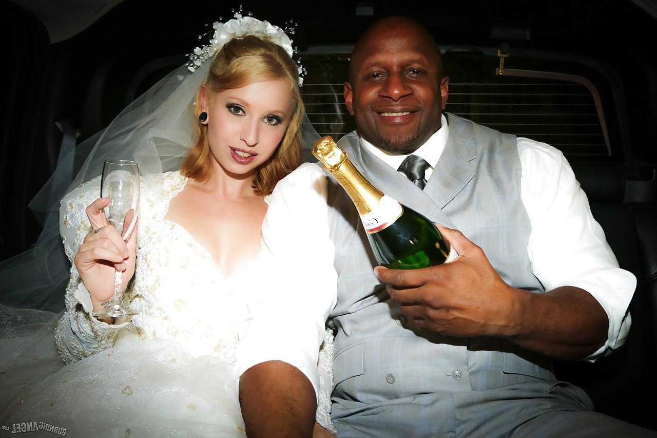 15P Blonde Eidyia tongues bbc & gets cum on tits in interracial wedding fuck