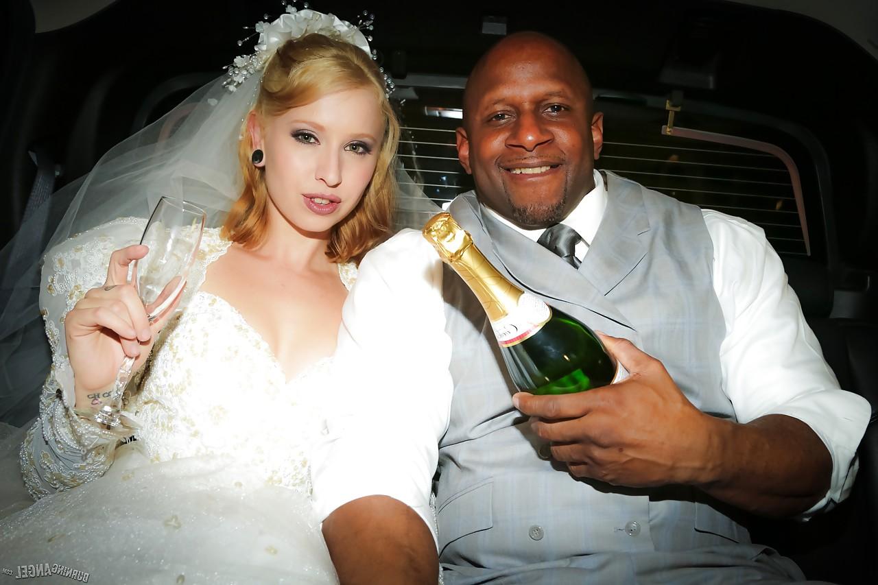 15P Blonde Eidyia tongues bbc & gets cum on tits in interracial wedding fuck