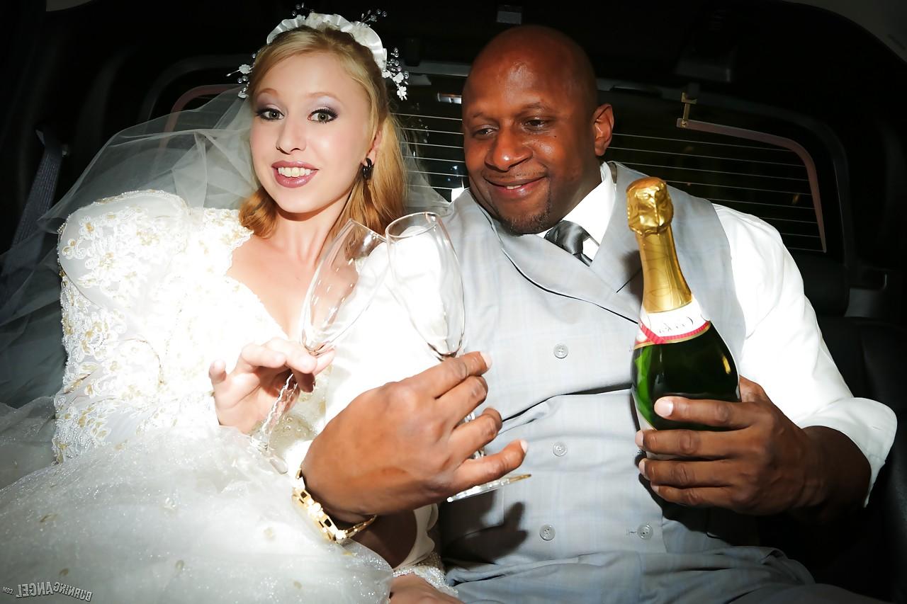 15P Blonde Eidyia tongues bbc & gets cum on tits in interracial wedding fuck