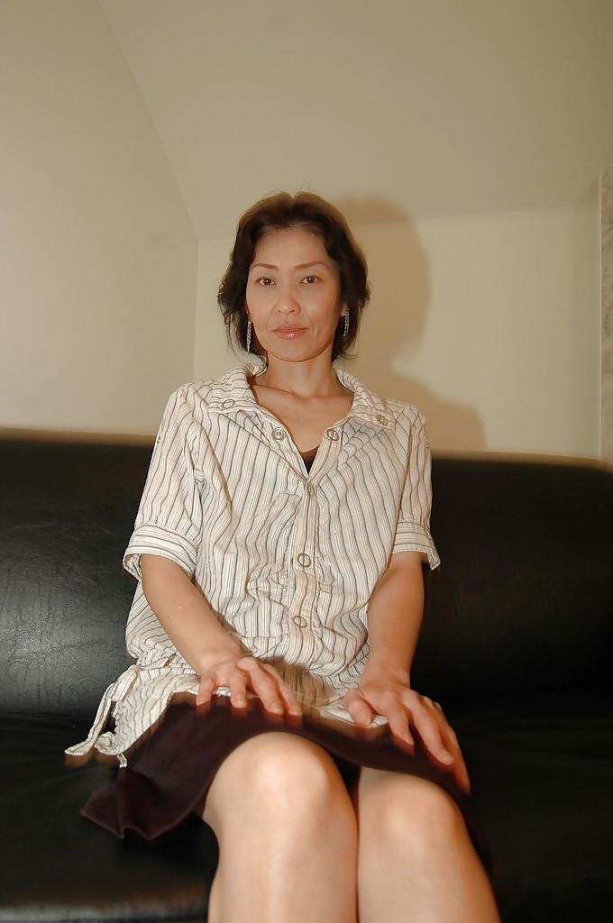 16P Naughty asian MILF takes off her skirt and has some pussy vibing fun