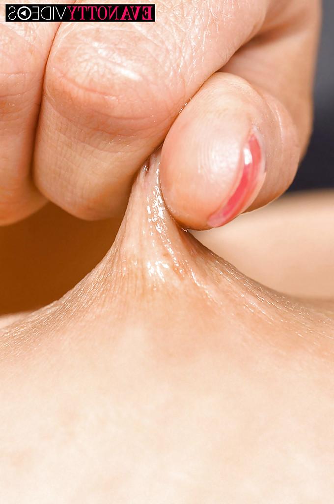 16P Busty MILF Eva Notty having big tits and nipples oiled on massage table