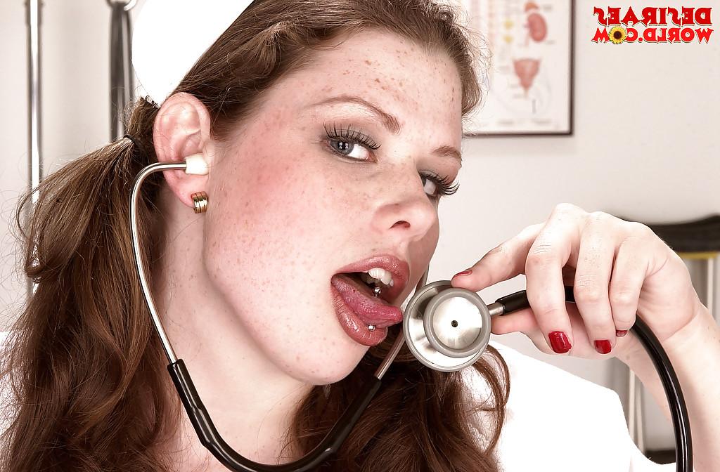16P Chesty brunette babe makes pornstar debut in sexy nurse uniform