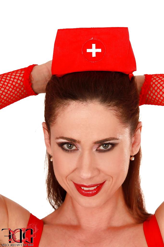 16P Lusty nurse in sexy uniform undressing and exposing her hairy gash