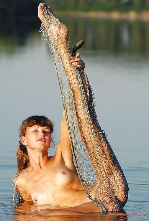 15P Tenn brunette posing in fishnet