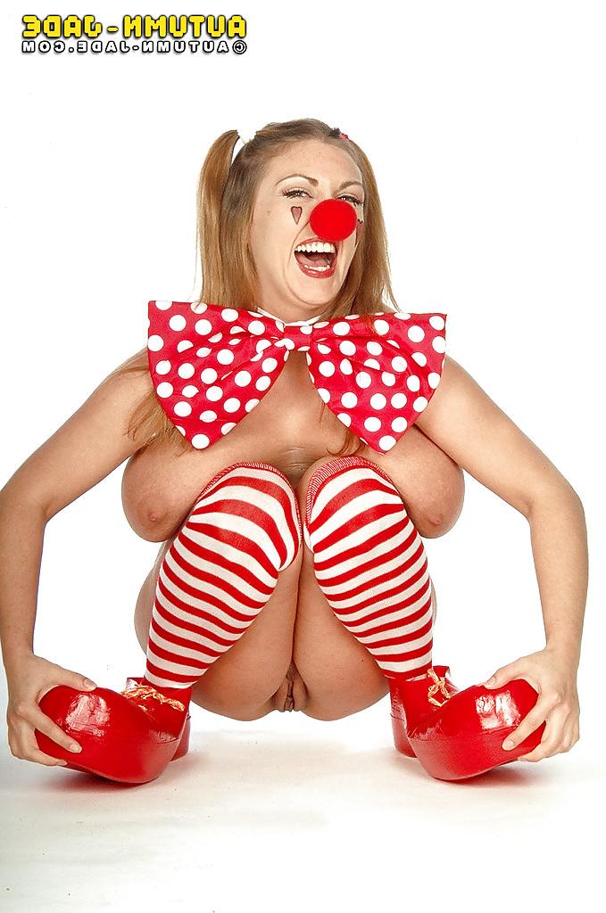 16P Solo girl Autumn Jade flaunting massive pornstar tits in clown outfit