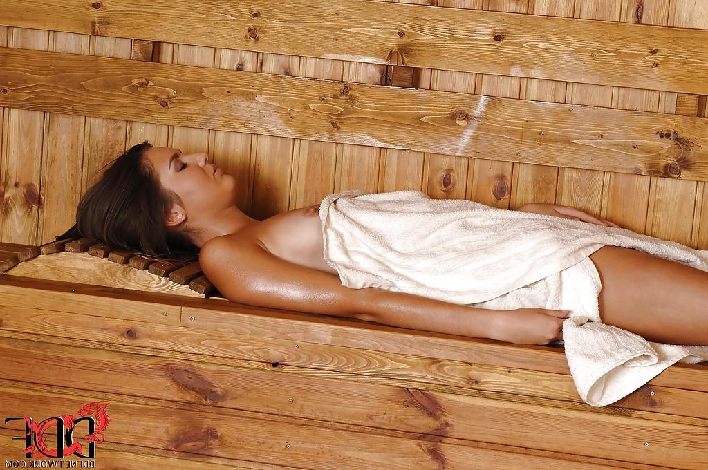 16P Smilley brunette sweetie with tanned skin revealing her goods in the sauna