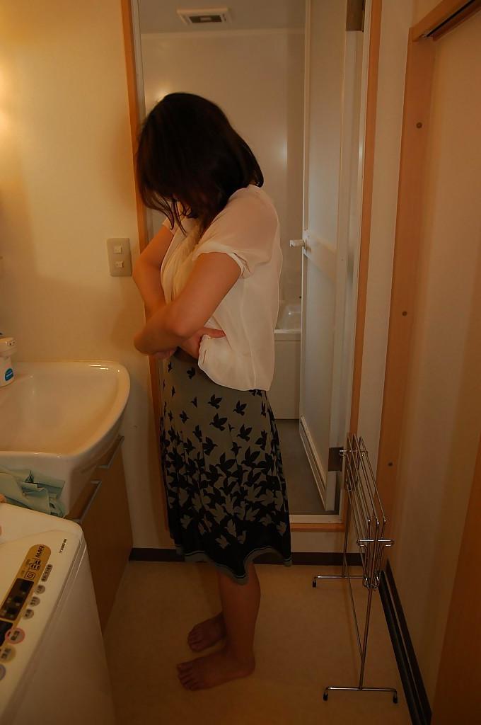 16P Asian MILF Haruko Ogura strips down and gets fucked tough after shower