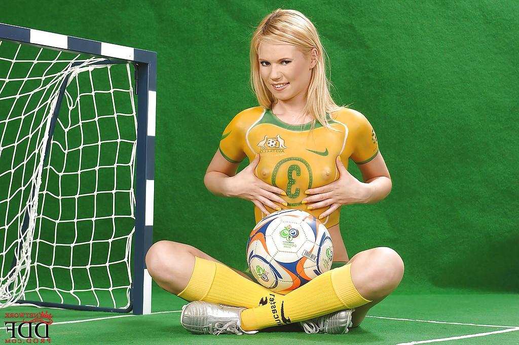 16P Yasmine Gold exposes her sexy curves covered with body painted sport uniform