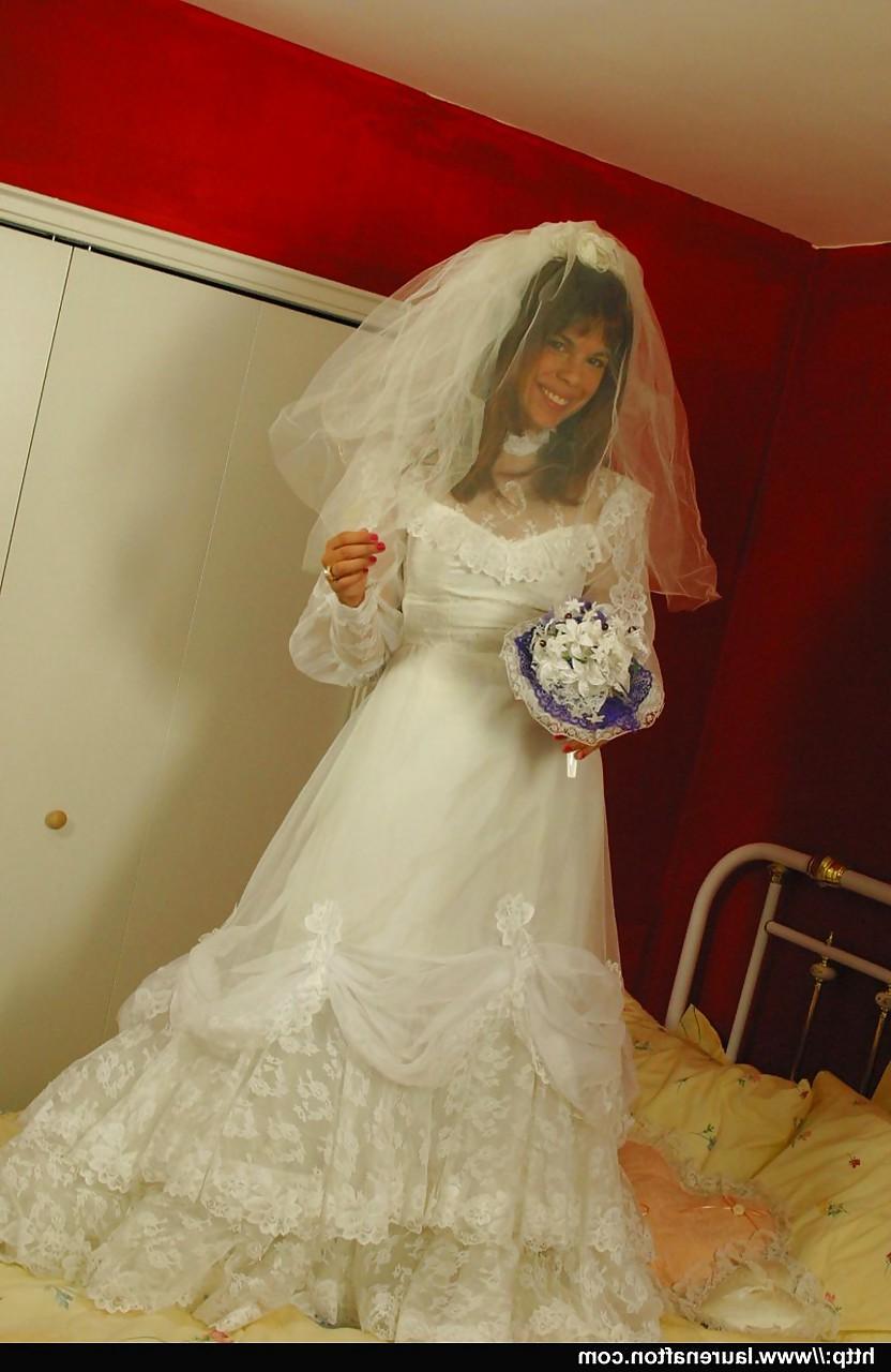 12P Hot bride Miss Abigail in stockings & high heels enjoys lesbian strapon fuck