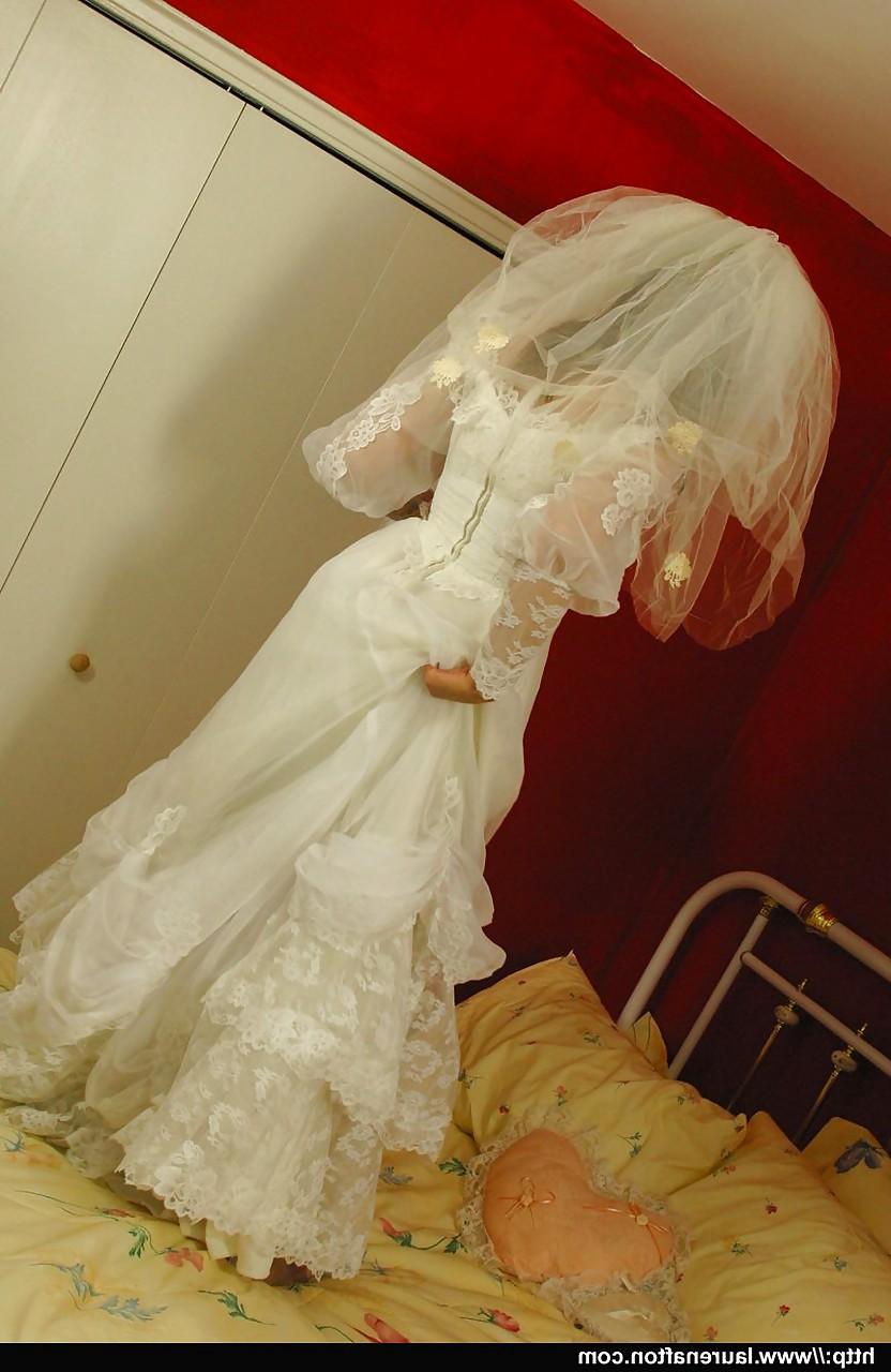 12P Hot bride Miss Abigail in stockings & high heels enjoys lesbian strapon fuck