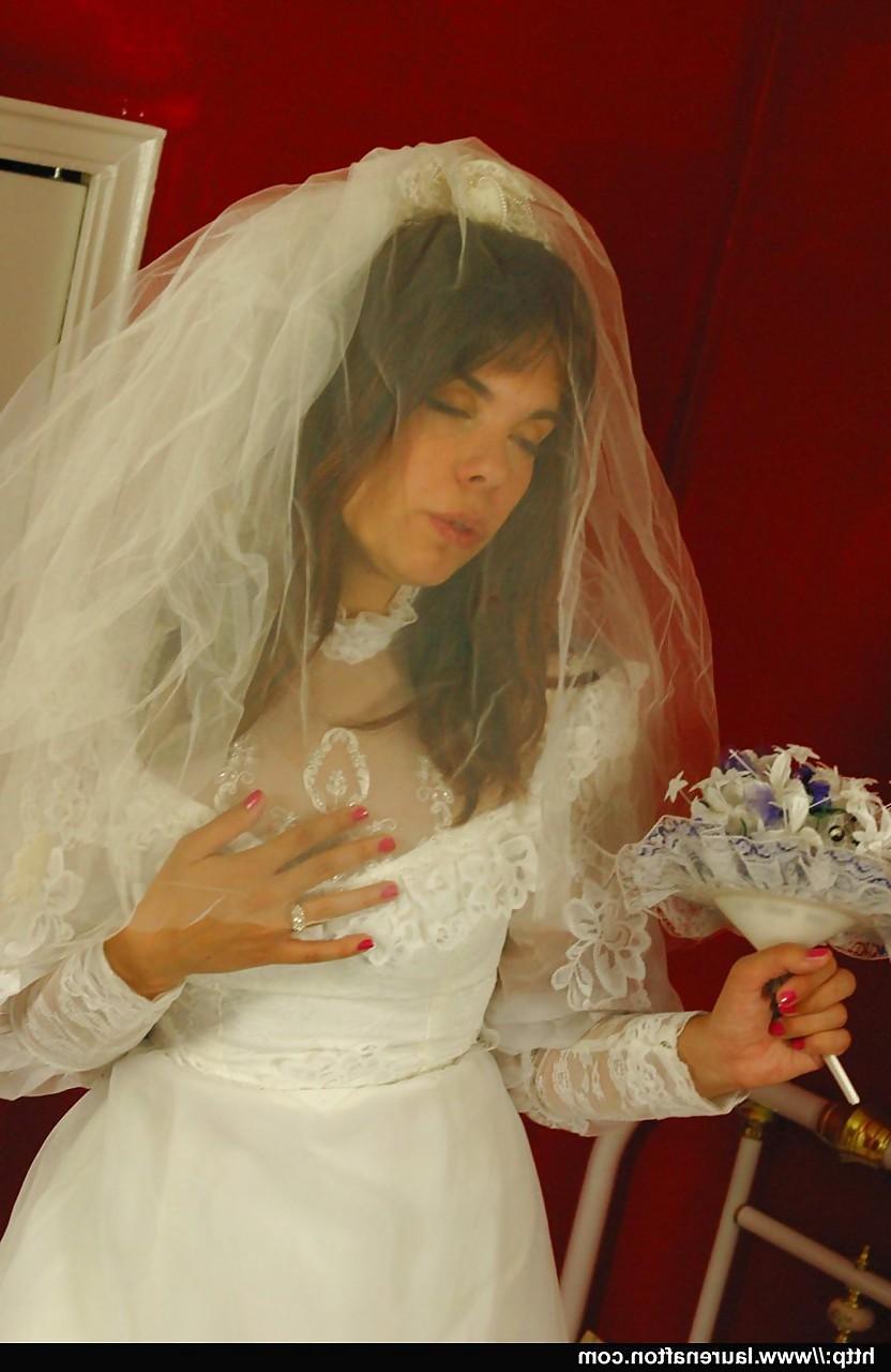 12P Hot bride Miss Abigail in stockings & high heels enjoys lesbian strapon fuck