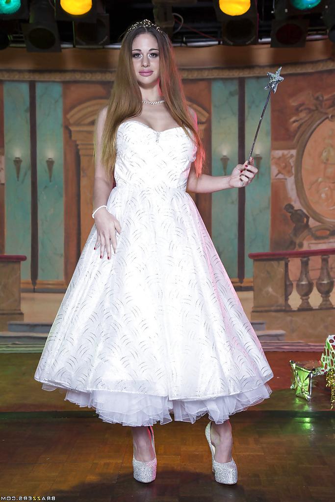 16P Naughty temptress in wedding dress uncovering her gorgeous curves
