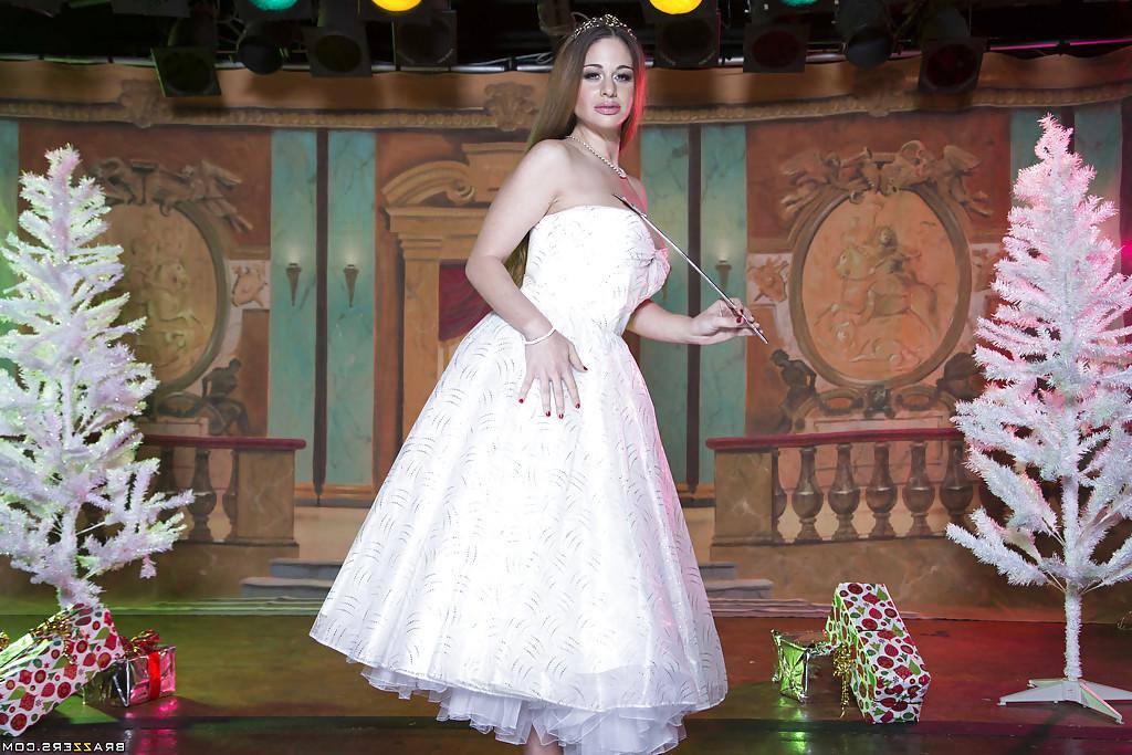 16P Naughty temptress in wedding dress uncovering her gorgeous curves