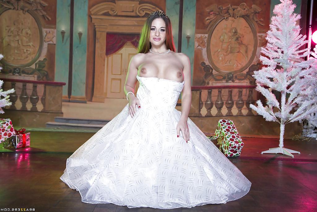 16P Naughty temptress in wedding dress uncovering her gorgeous curves