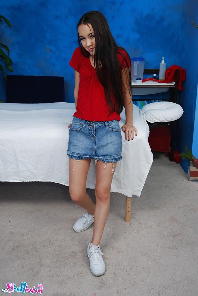 16P Skinny teen with tiny tits strips and lays on the massage table