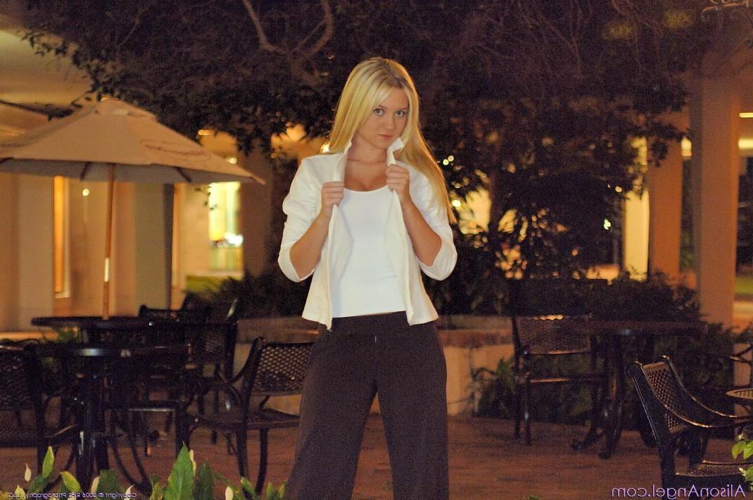 20P Pictures of teen amateur Alison Angel using the ATM topless