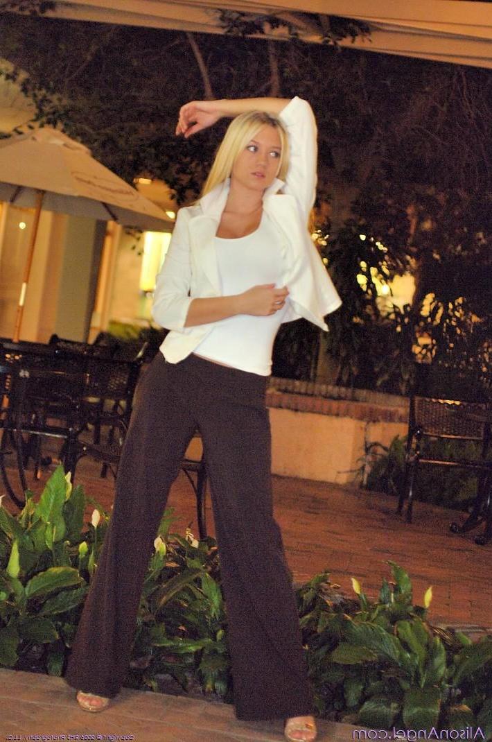20P Pictures of teen amateur Alison Angel using the ATM topless