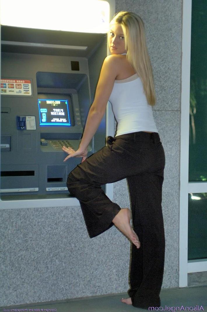 20P Pictures of teen amateur Alison Angel using the ATM topless