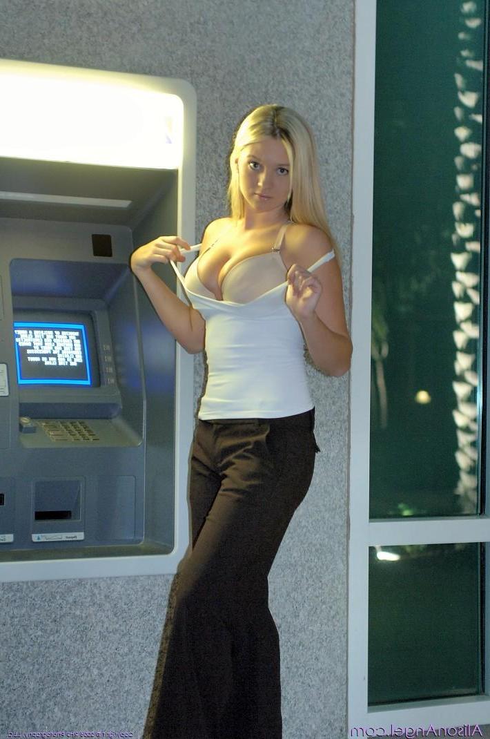 20P Pictures of teen amateur Alison Angel using the ATM topless