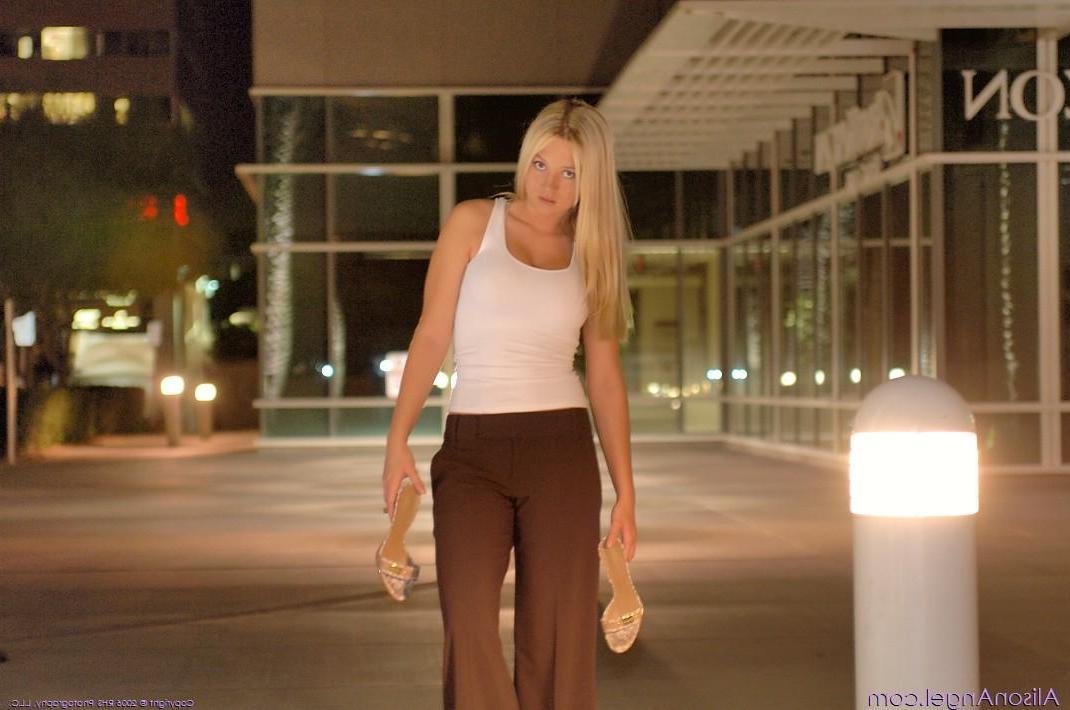 20P Pictures of teen amateur Alison Angel using the ATM topless