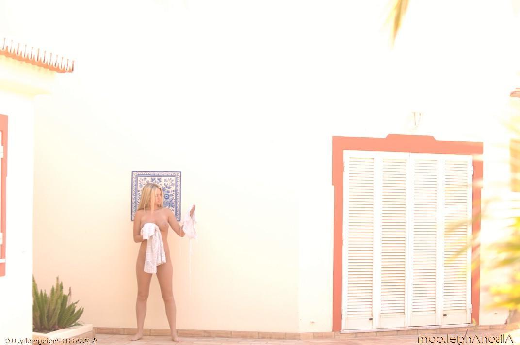 20P Pictures of teen Alison Angel getting naked outside during her vacation