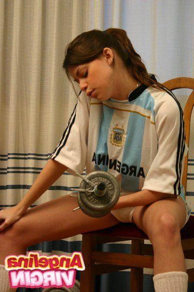 16P Pictures of teen cutie Angelina Virgin teasing with no top on
