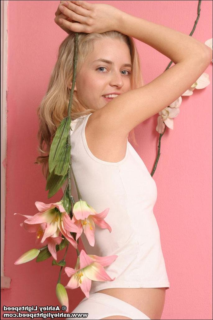 20P Pictures of Ashley Lightspeed showing you her small tits