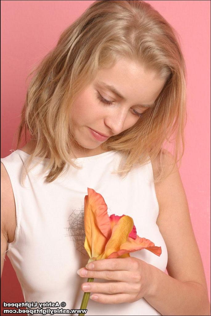 20P Pictures of Ashley Lightspeed showing you her small tits