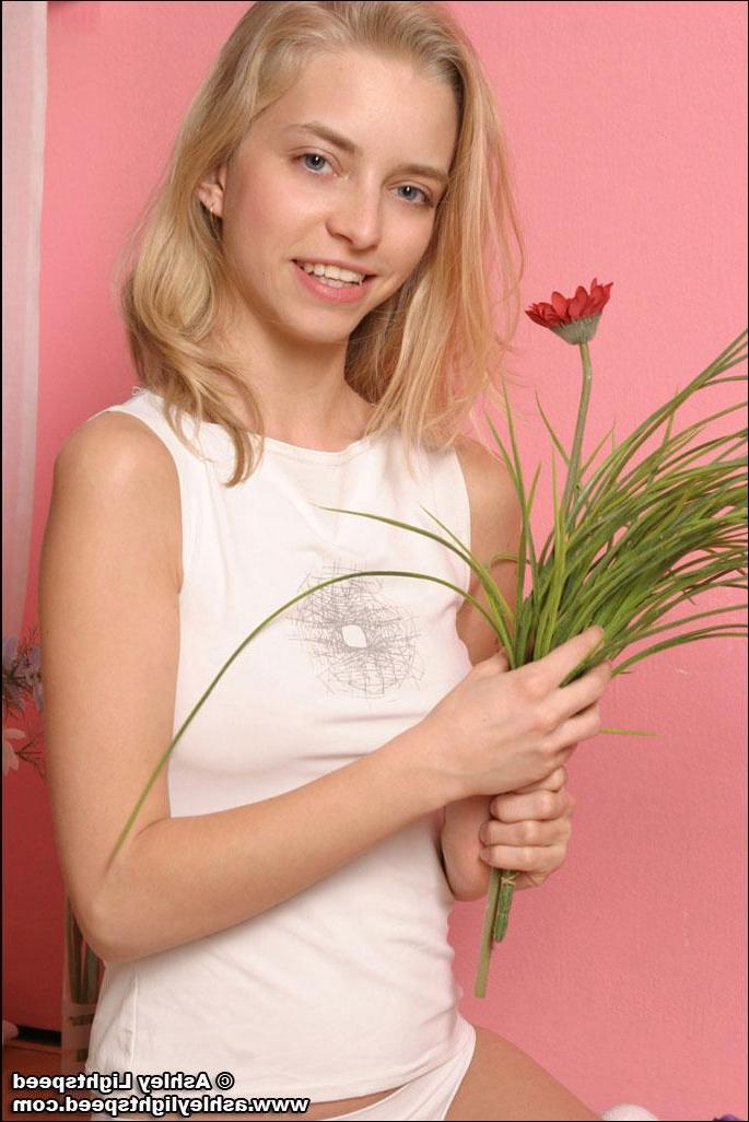 20P Pictures of Ashley Lightspeed showing you her small tits