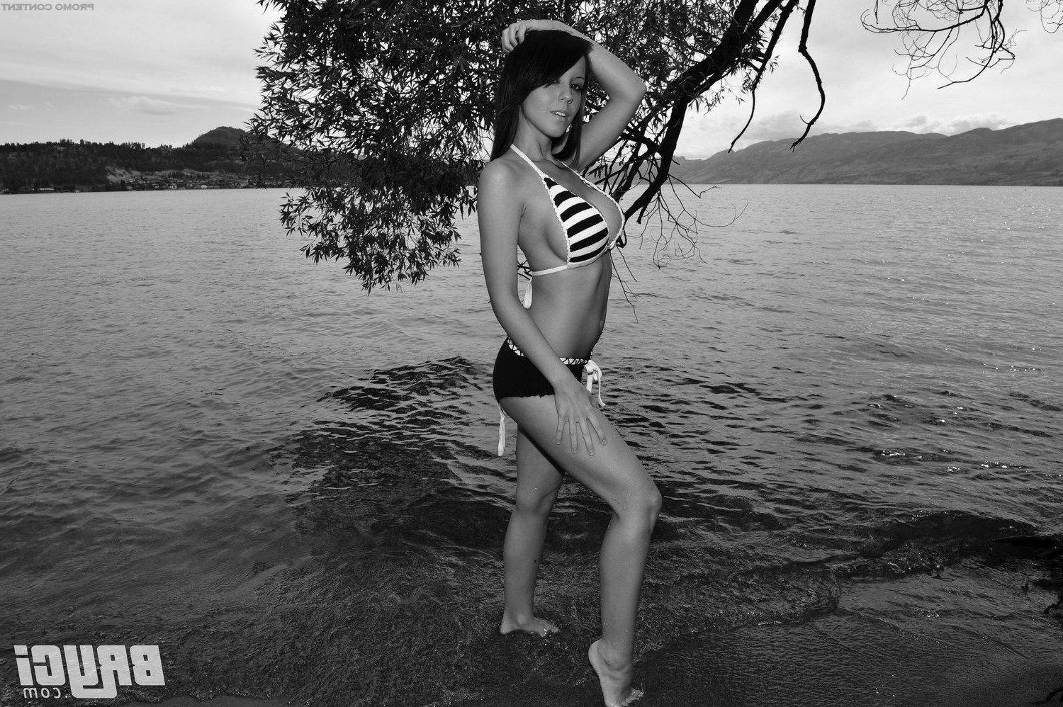 15P Pictures of Bryci flashing her tits in black and white