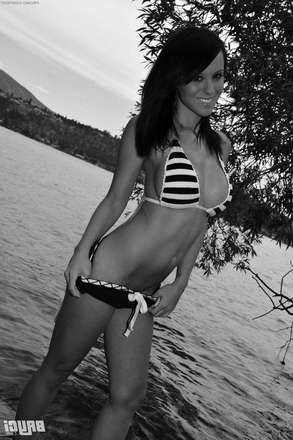 15P Pictures of Bryci flashing her tits in black and white