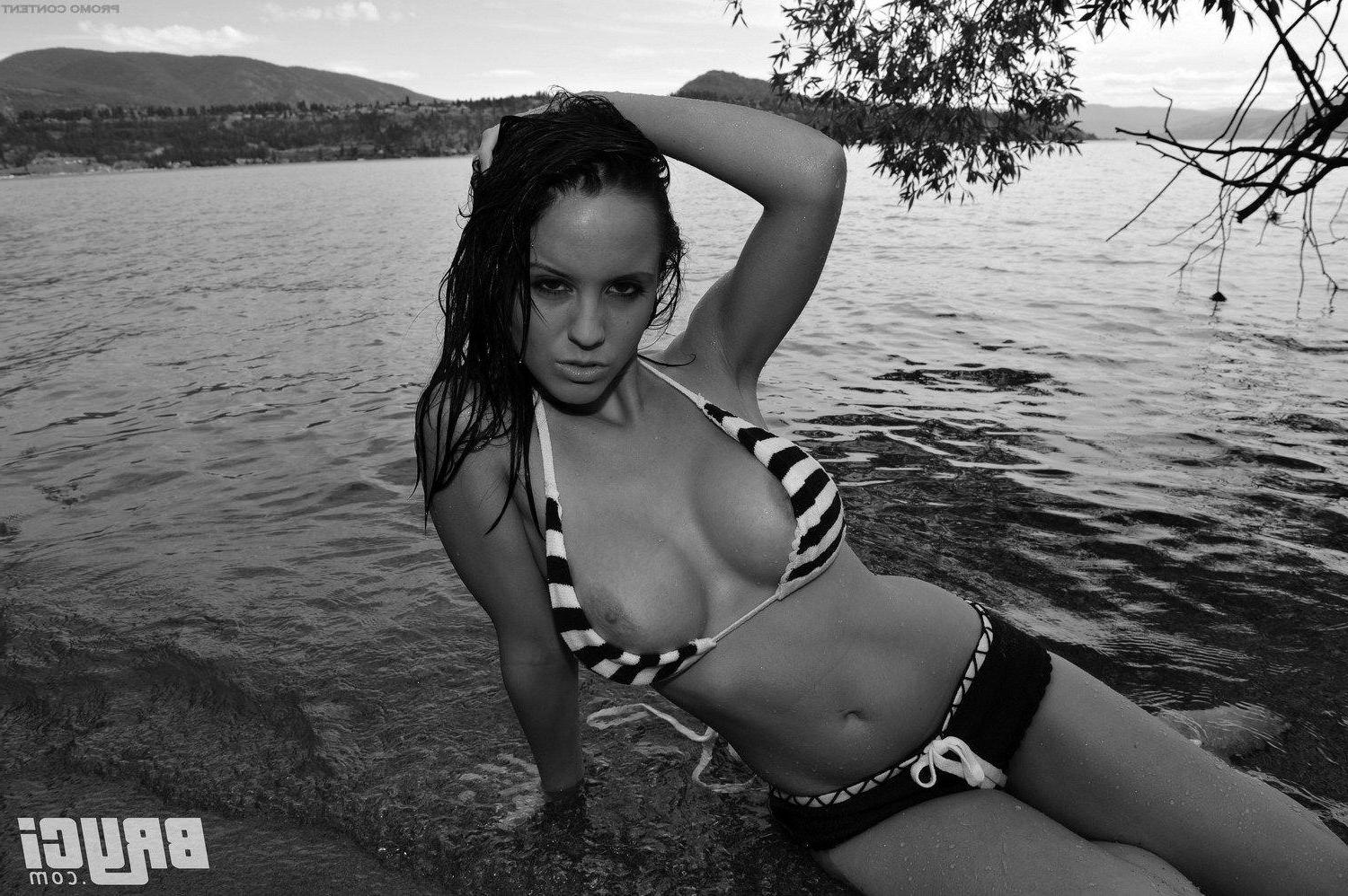 15P Pictures of Bryci flashing her tits in black and white