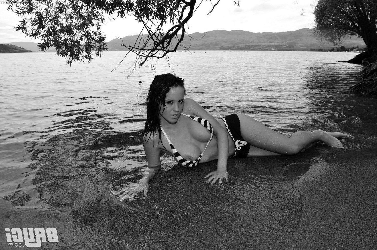 15P Pictures of Bryci flashing her tits in black and white