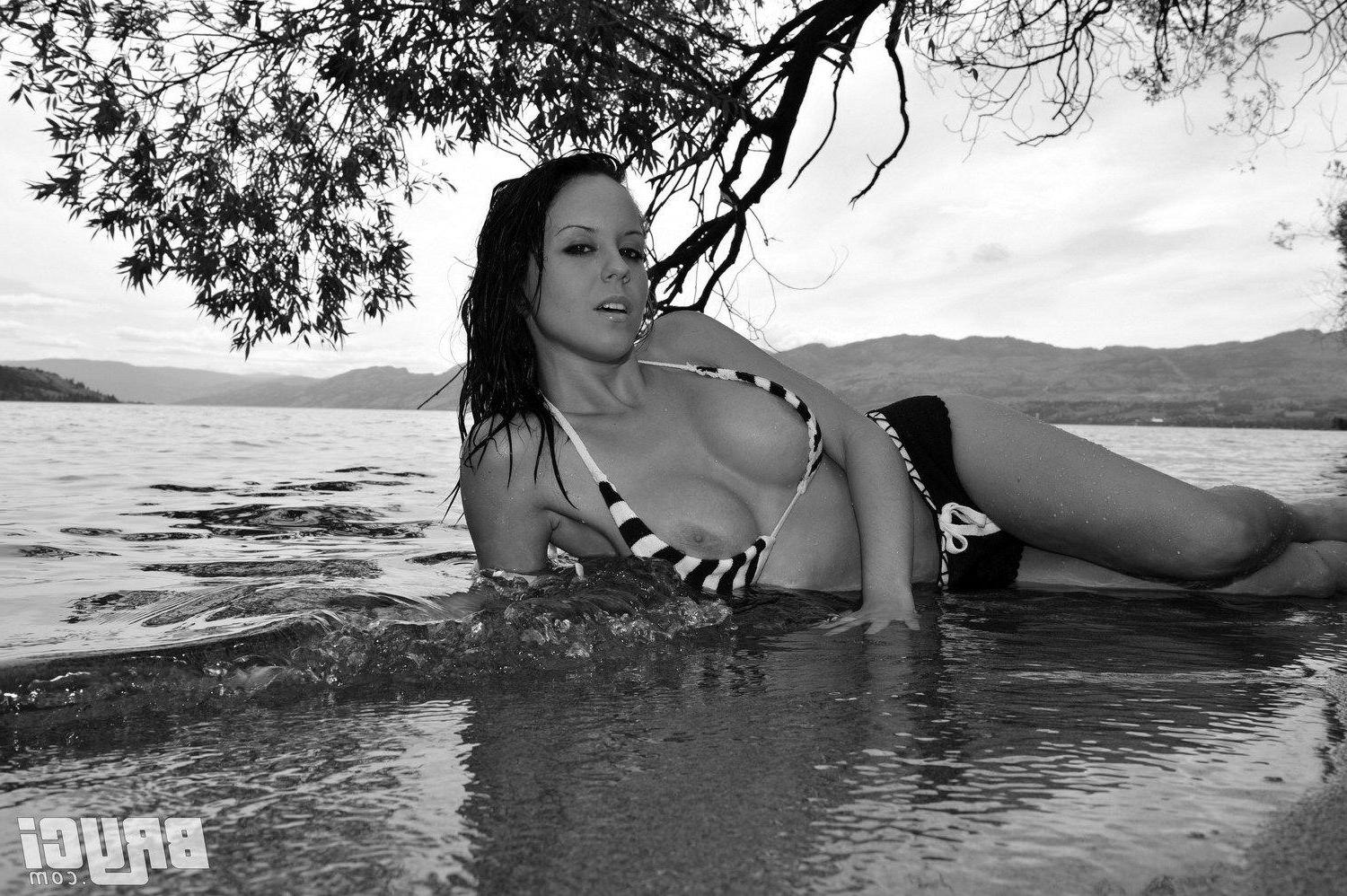 15P Pictures of Bryci flashing her tits in black and white