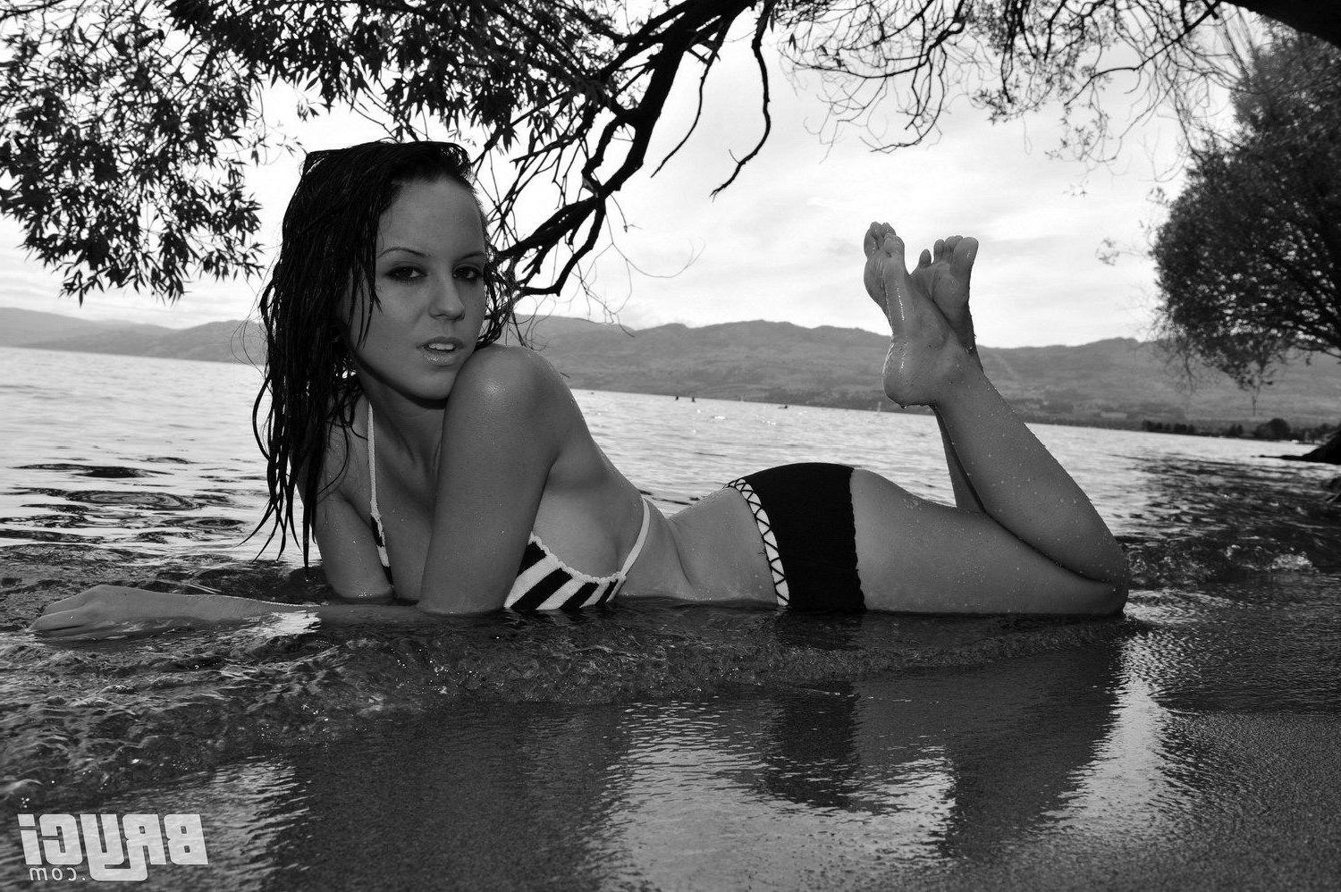 15P Pictures of Bryci flashing her tits in black and white