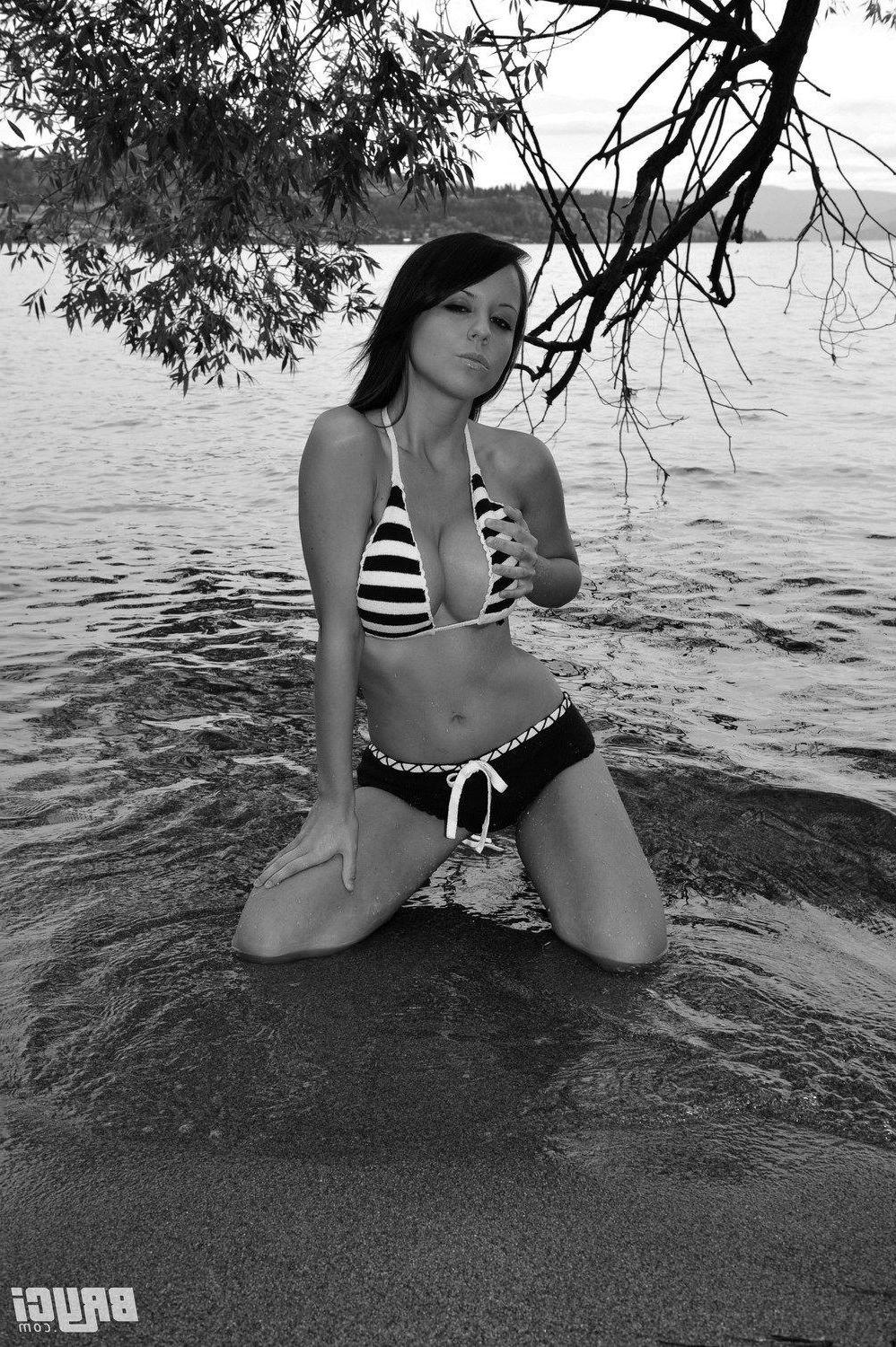 15P Pictures of Bryci flashing her tits in black and white