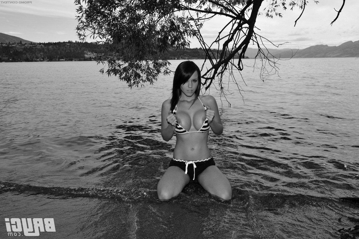 15P Pictures of Bryci flashing her tits in black and white