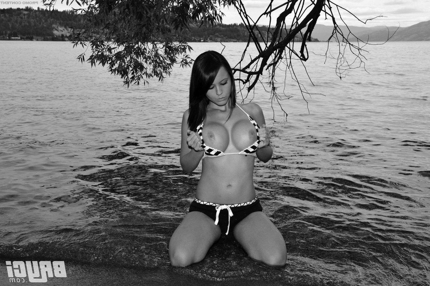 15P Pictures of Bryci flashing her tits in black and white